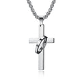 Silver cross necklace on a white background