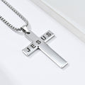 Silver cross pendant with 'JESUS' engraved on a white background