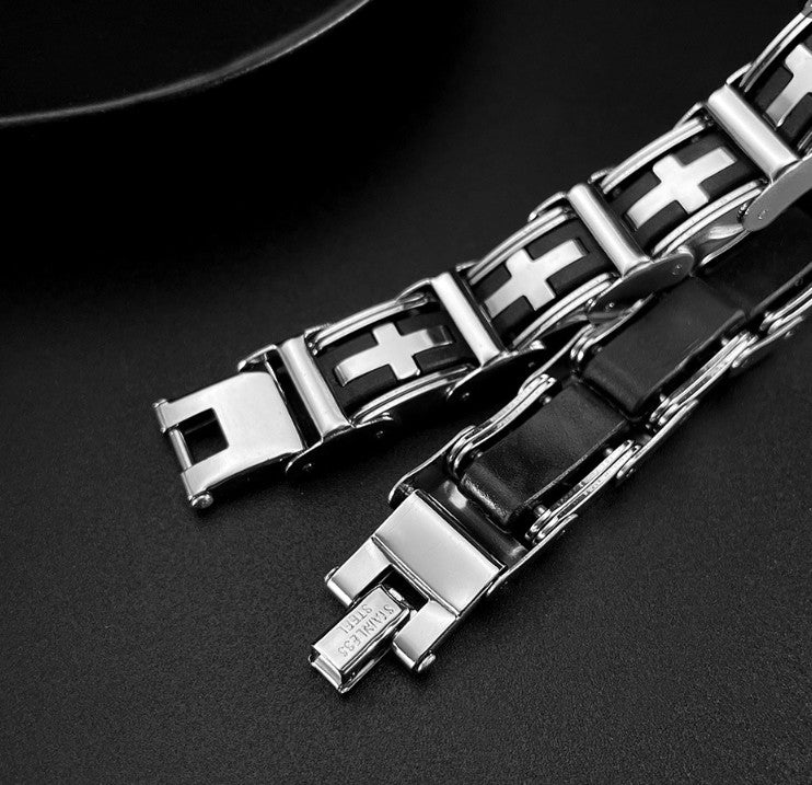 Black and silver metal bracelet on a dark background