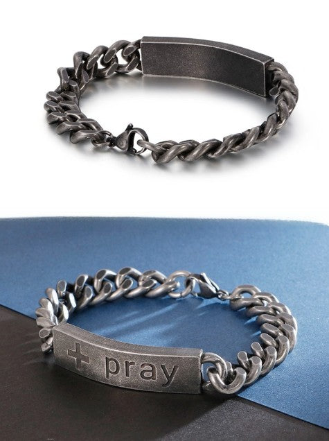 Two silver chain bracelets with engraved text on a white and blue background