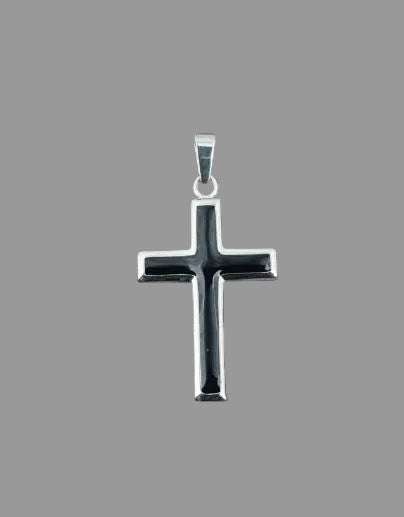 Silver cross pendant on a gray background