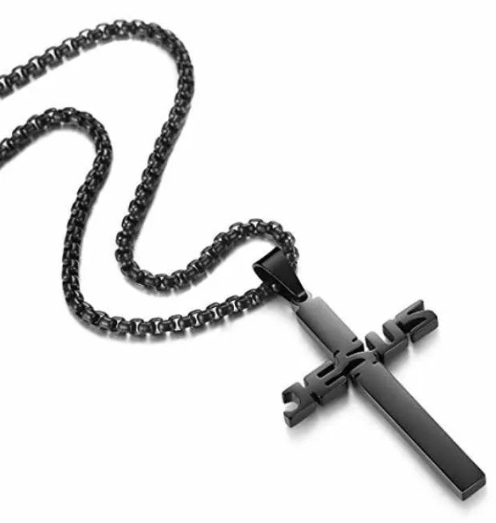 Black cross pendant necklace on a white background