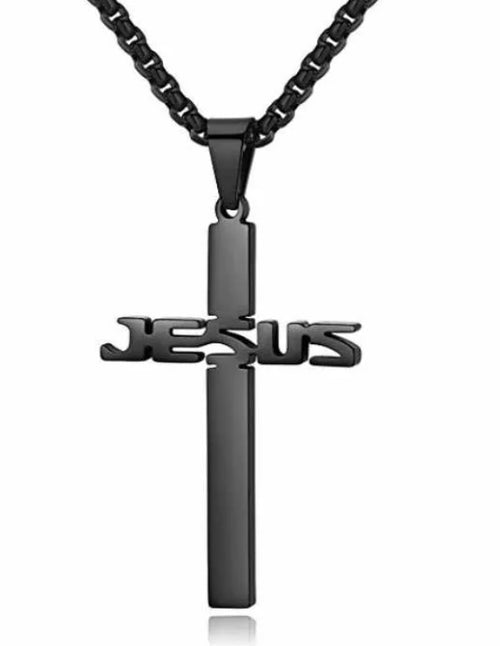Black 'JESUS' cross pendant on a chain against a white background