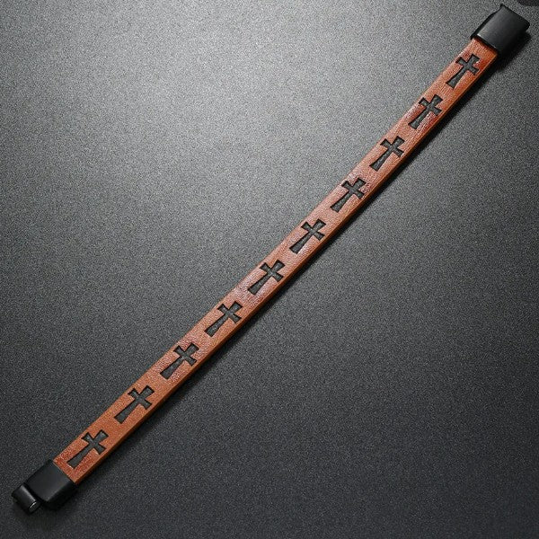 Brown leather bracelet with black cross patterns on a dark gray background