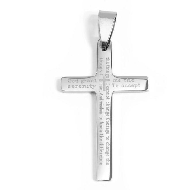 Silver cross pendant with engraved text on a white background
