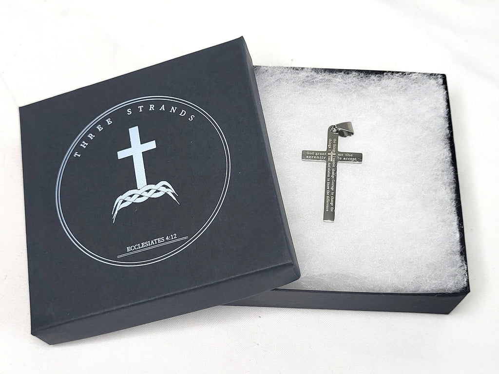 Black Three Strands jewelry box with a cross pendant on a white background
